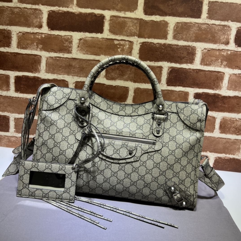 G*u*i top handle bags